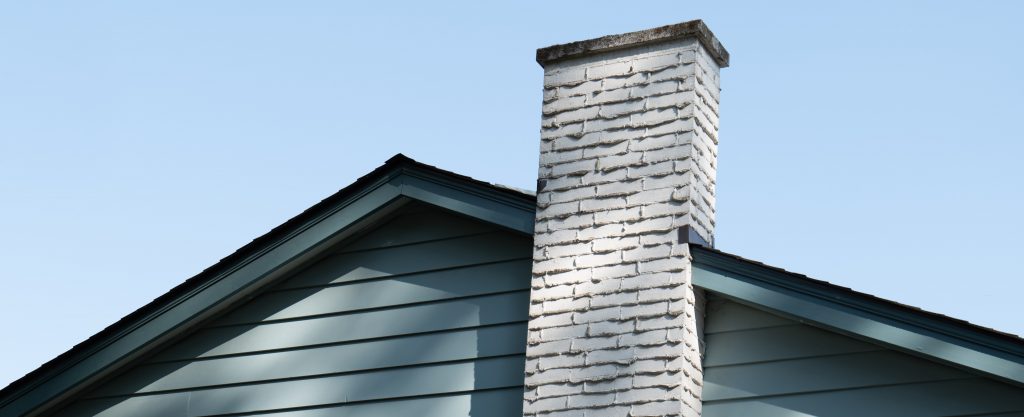 white chimney on house